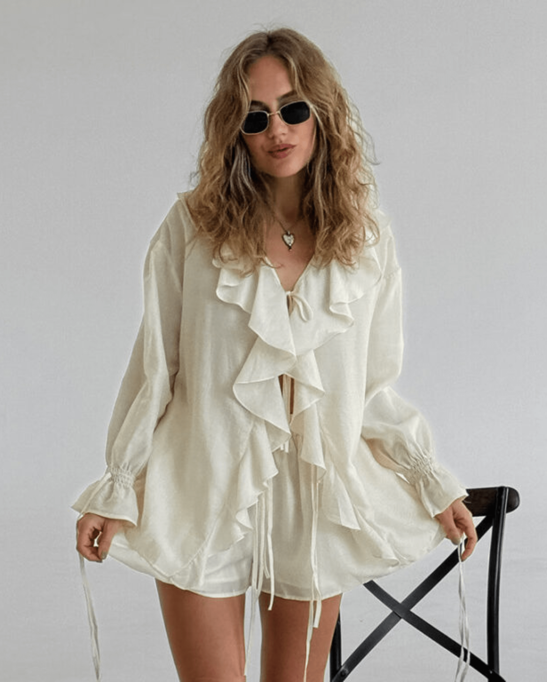 Elegant Miakee fashion display image highlighting trendy outfits against a soft, understated background