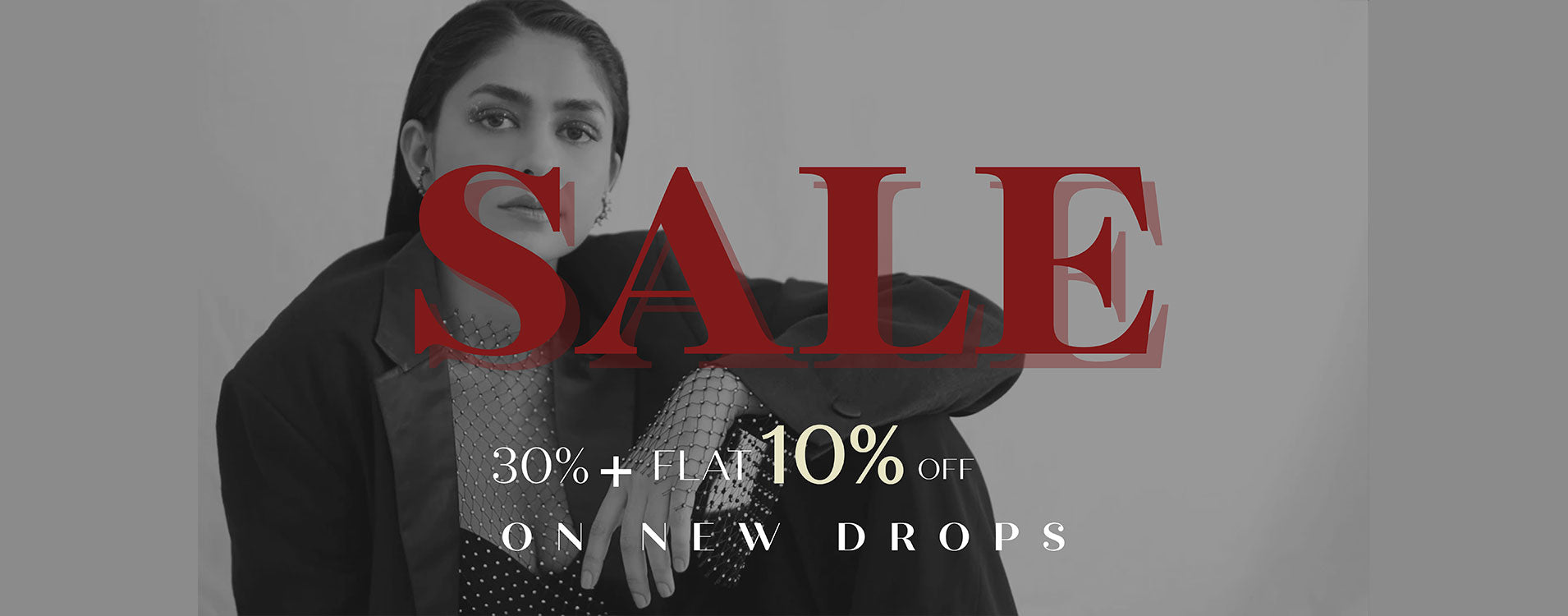 Miakee clothing sale banner showcasing bold red SALE typography on an elegant fashion backdrop and accessories